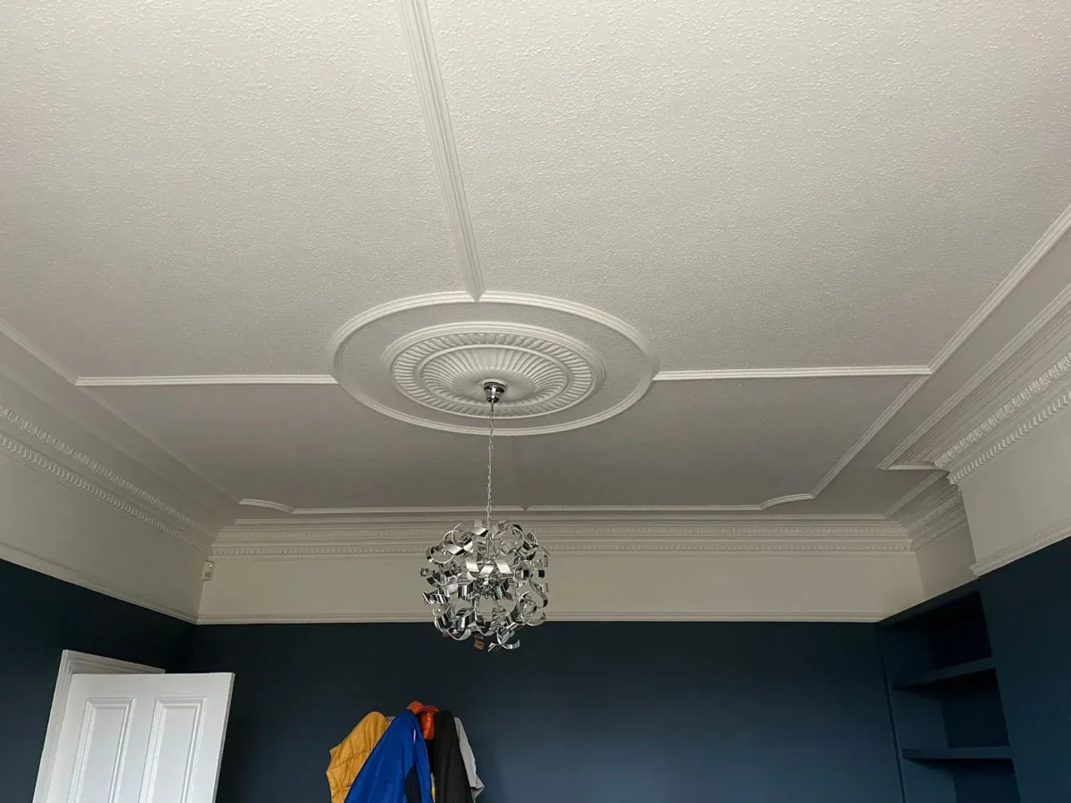 Freshly finished smooth ceiling with decorative coving